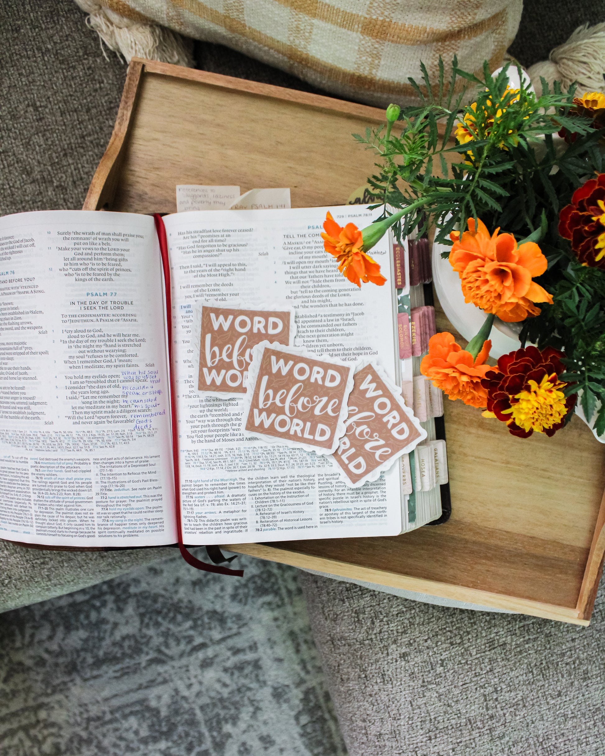 Open Bible on couch with faith-based vinyl stickers 