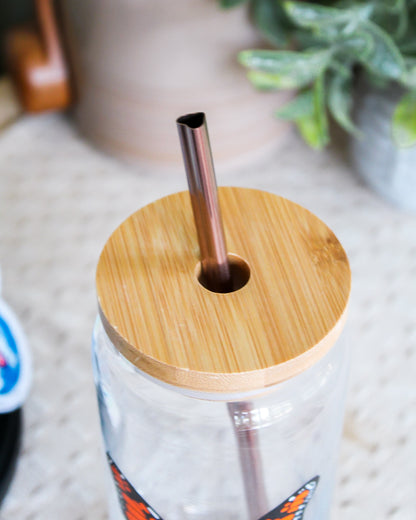 Heart shaped metal straw and bamboo lid on 20 ounce glass can