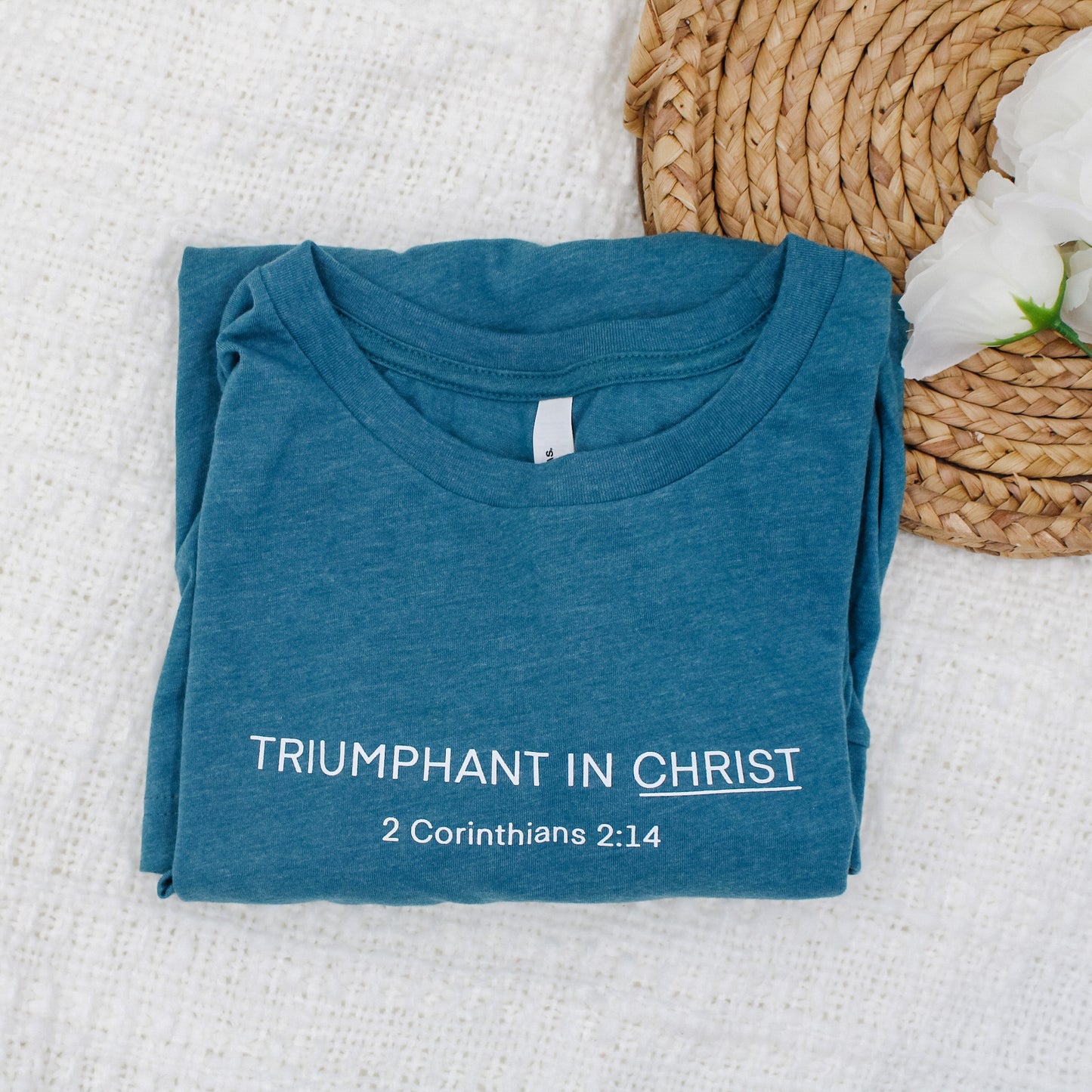 "Triumphant in Christ" UNISEX Long-Sleeve T-Shirt (Color: Heathered Teal)