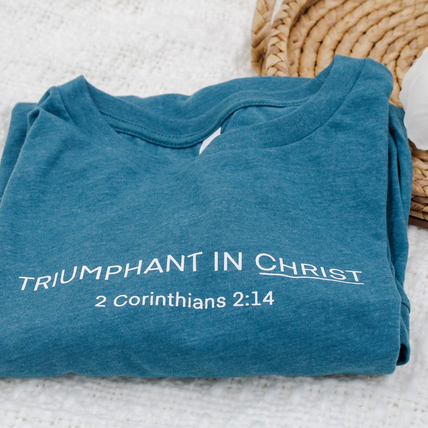 "Triumphant in Christ" UNISEX Long-Sleeve T-Shirt (Color: Heathered Teal)